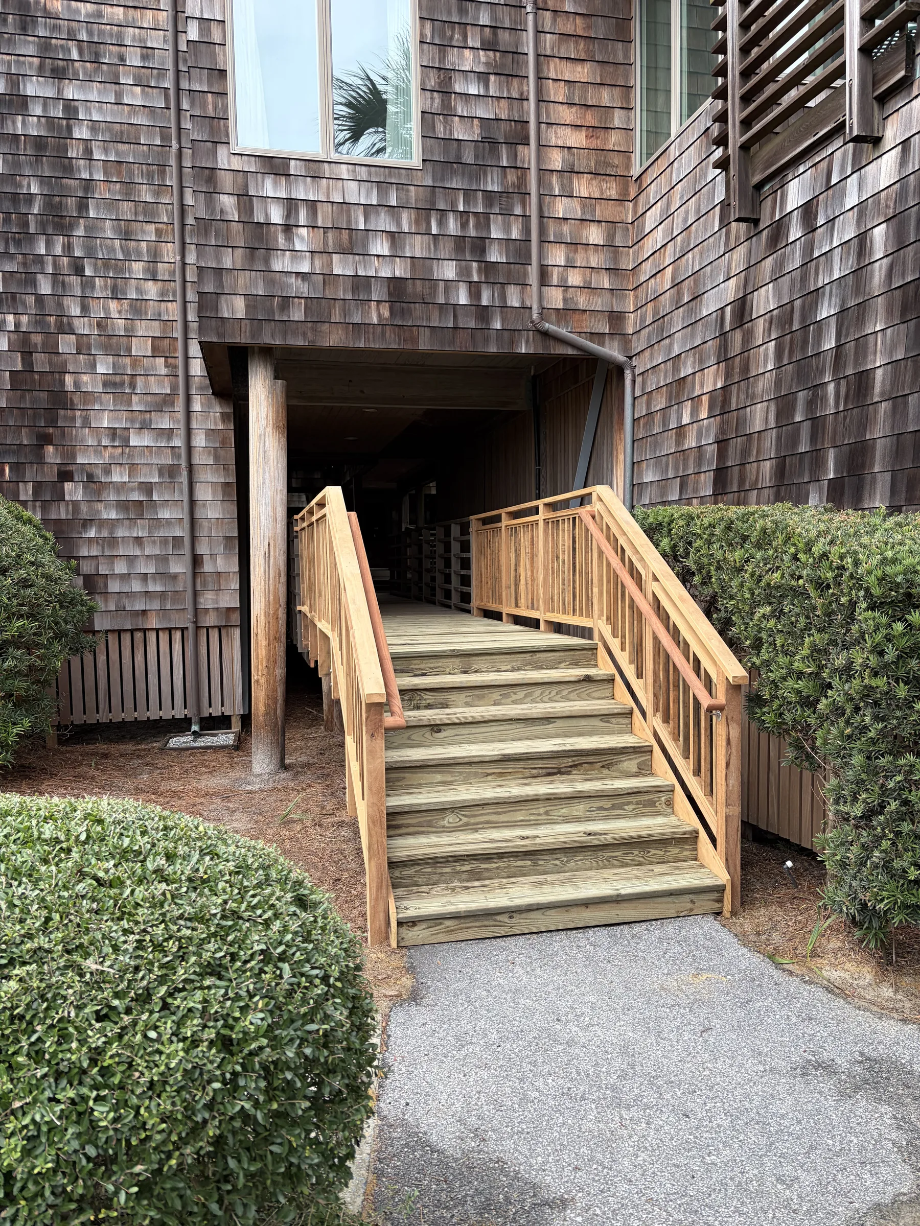 Oceanfront exterior stair renovation detail
